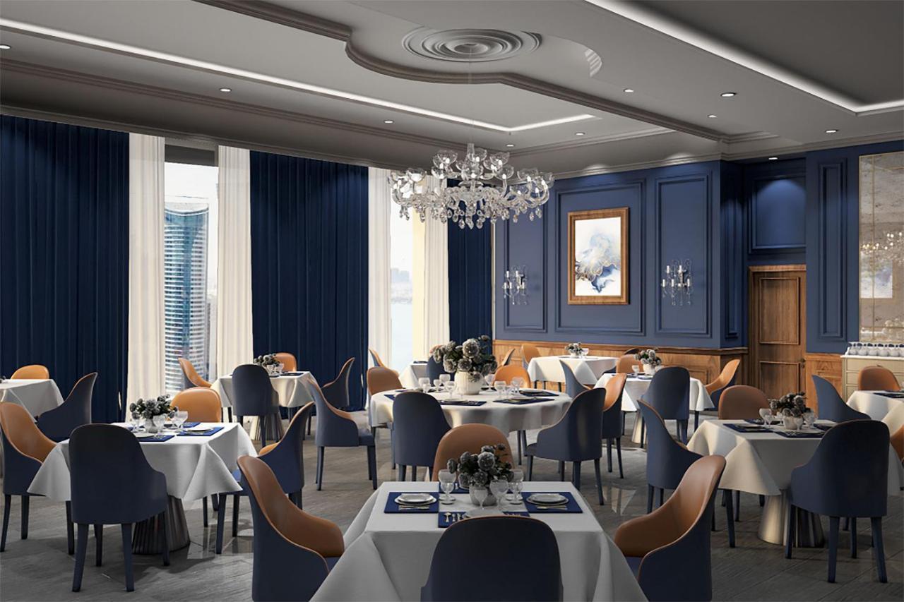 The Bentley Luxury Hotel & Suites 도하 외부 사진 The interior of the restaurant